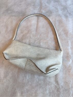Textured Cream Shoulder Bag with Sculpted Silhouette